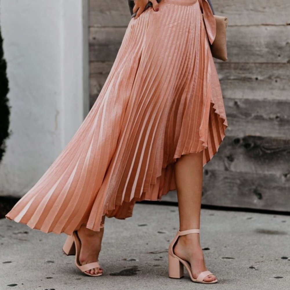 Pleated asymmetrical skirt